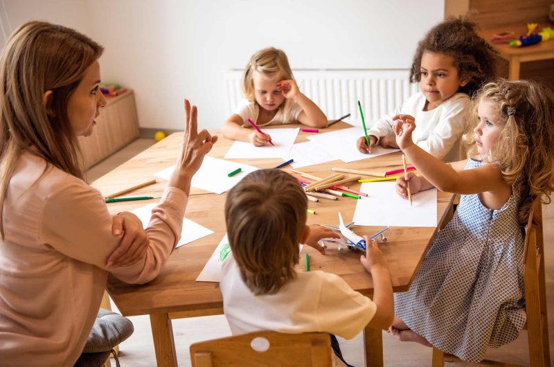 educator-teaching-adorable-multicultural-children-2022-11-02-03-52-15-utc.jpg